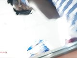 Ebony with sheer brown panties under blue polka dotted skirt