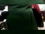 Mature BIg ass in super market in green dejllaba