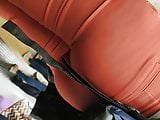 Hot secretary ass in orange pants candid
