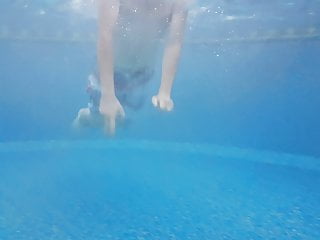 bearded young man in the swimming pool